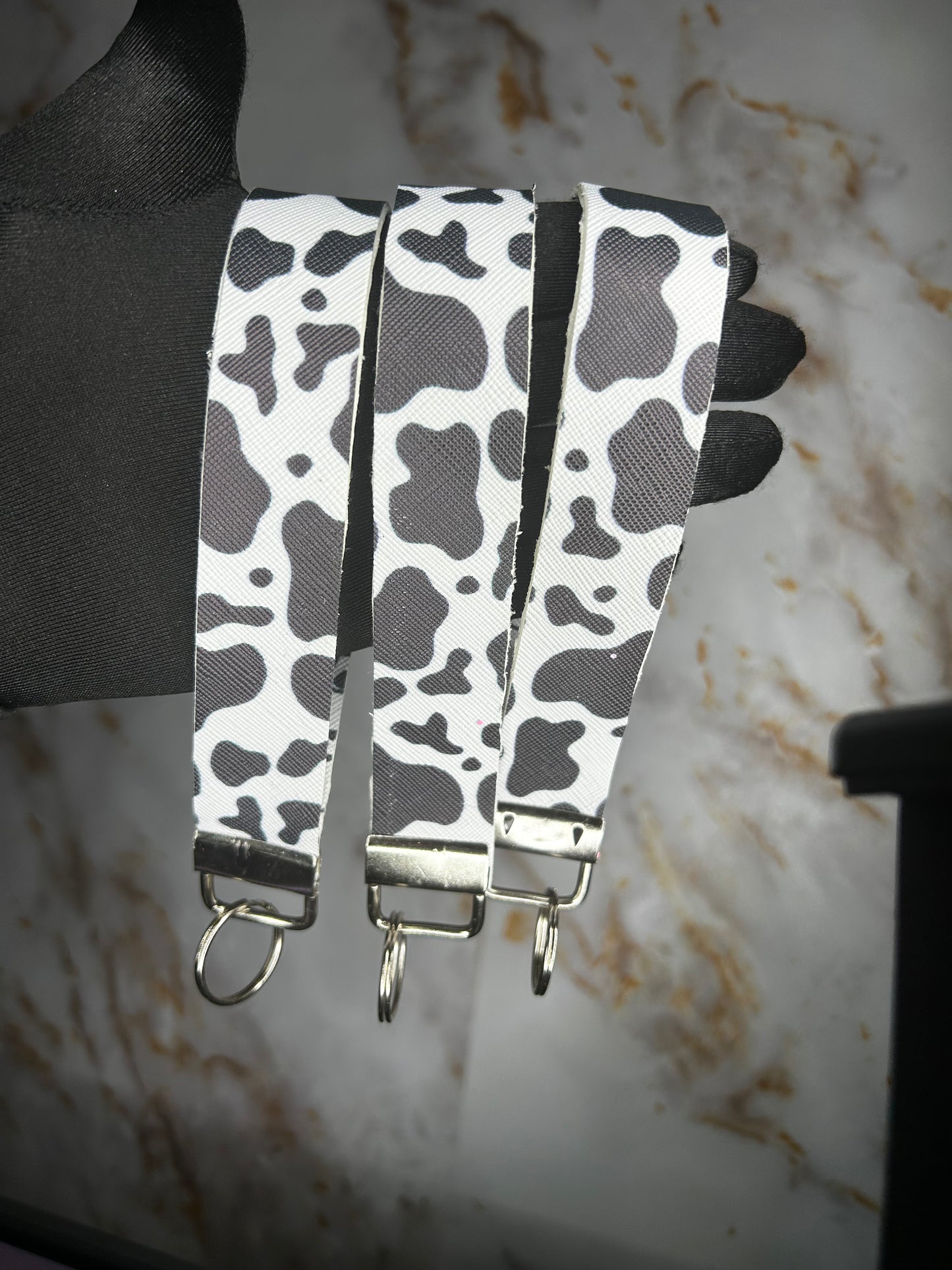 Cow print wristlet