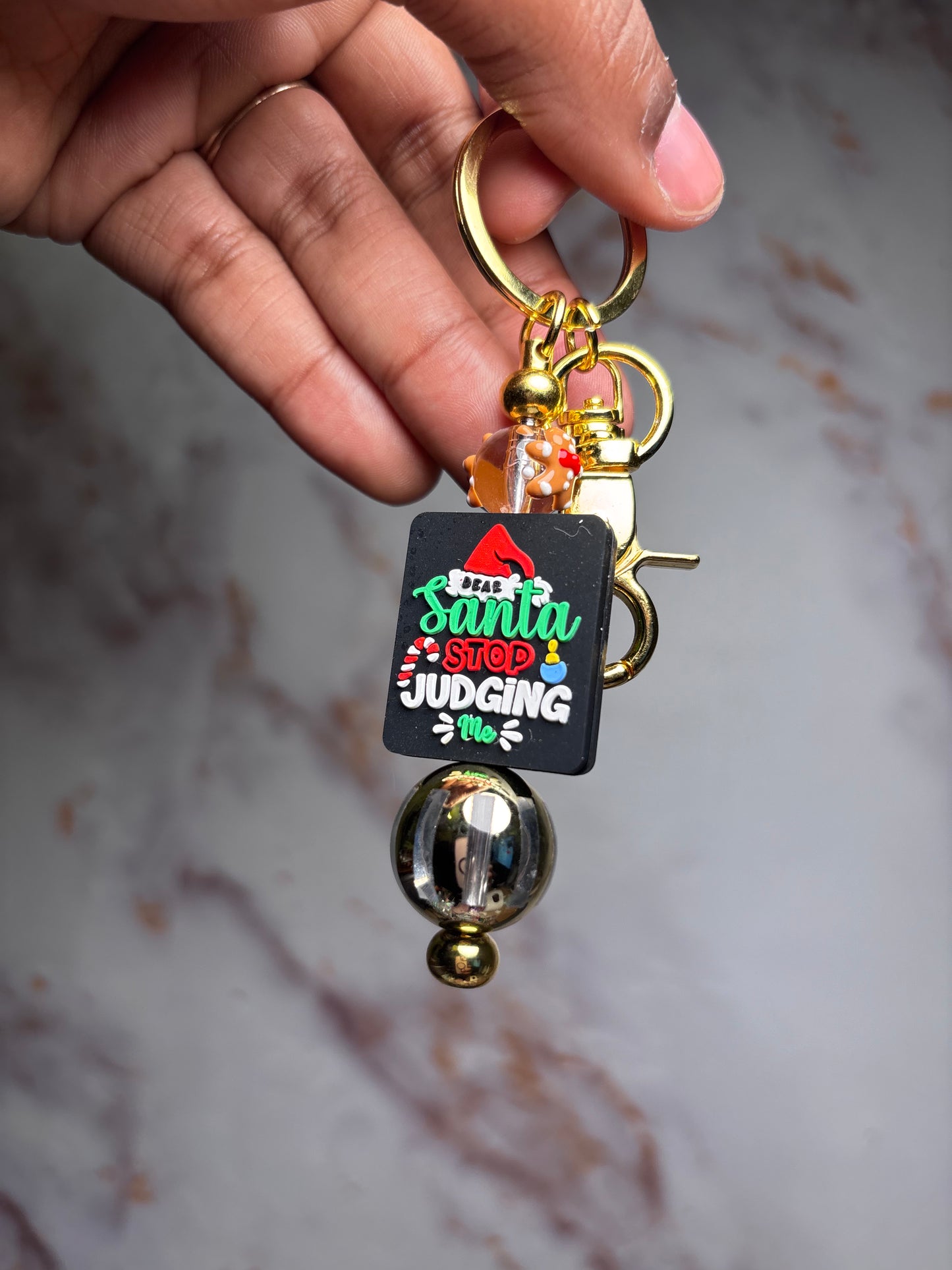 Santa judging keychain badge