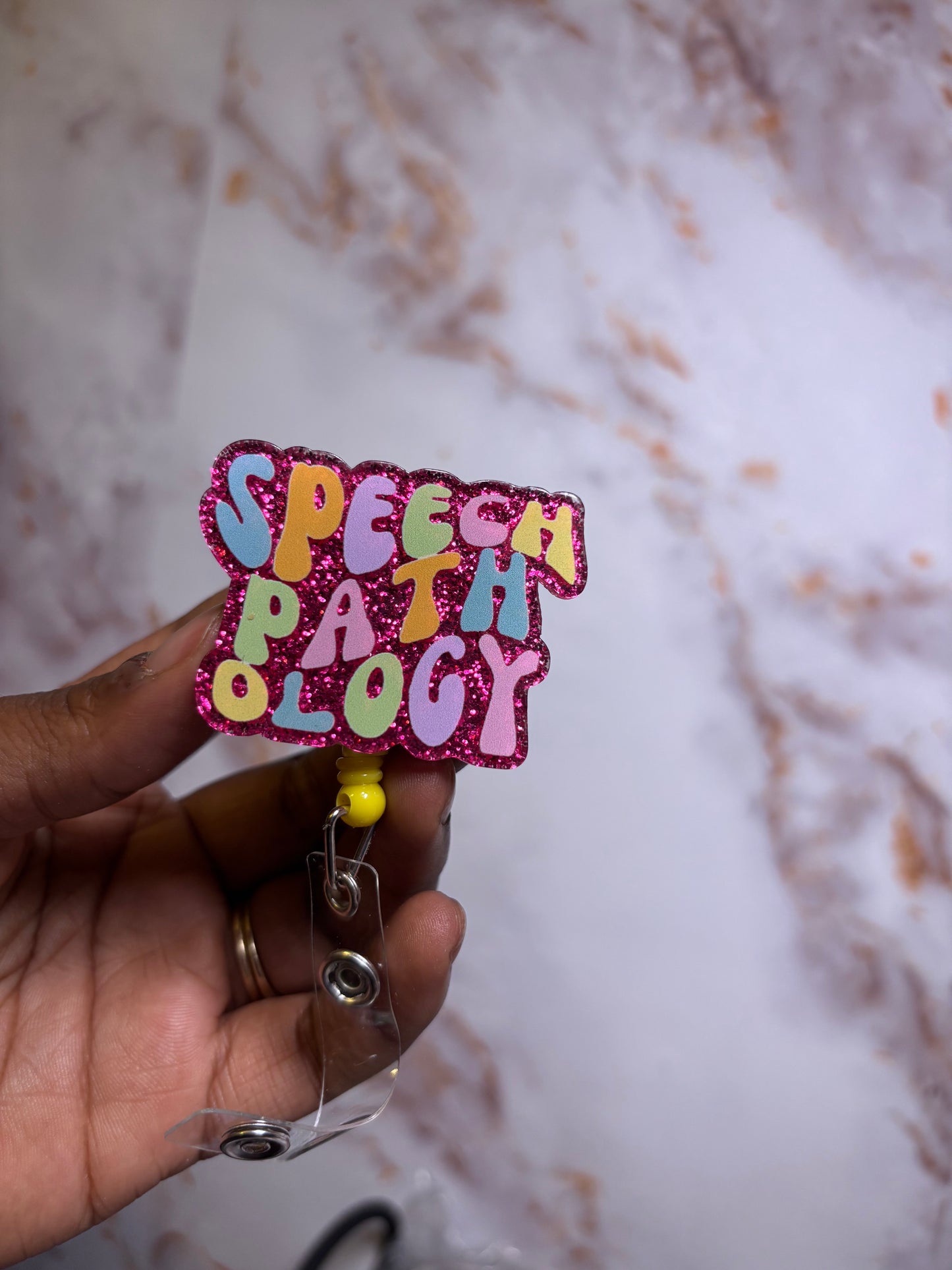 Speech pathology badge