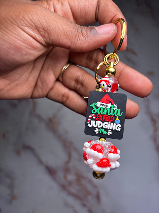 Santa judging 2 keychain badge