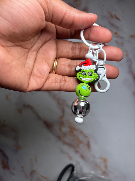 Grinch keychain badge