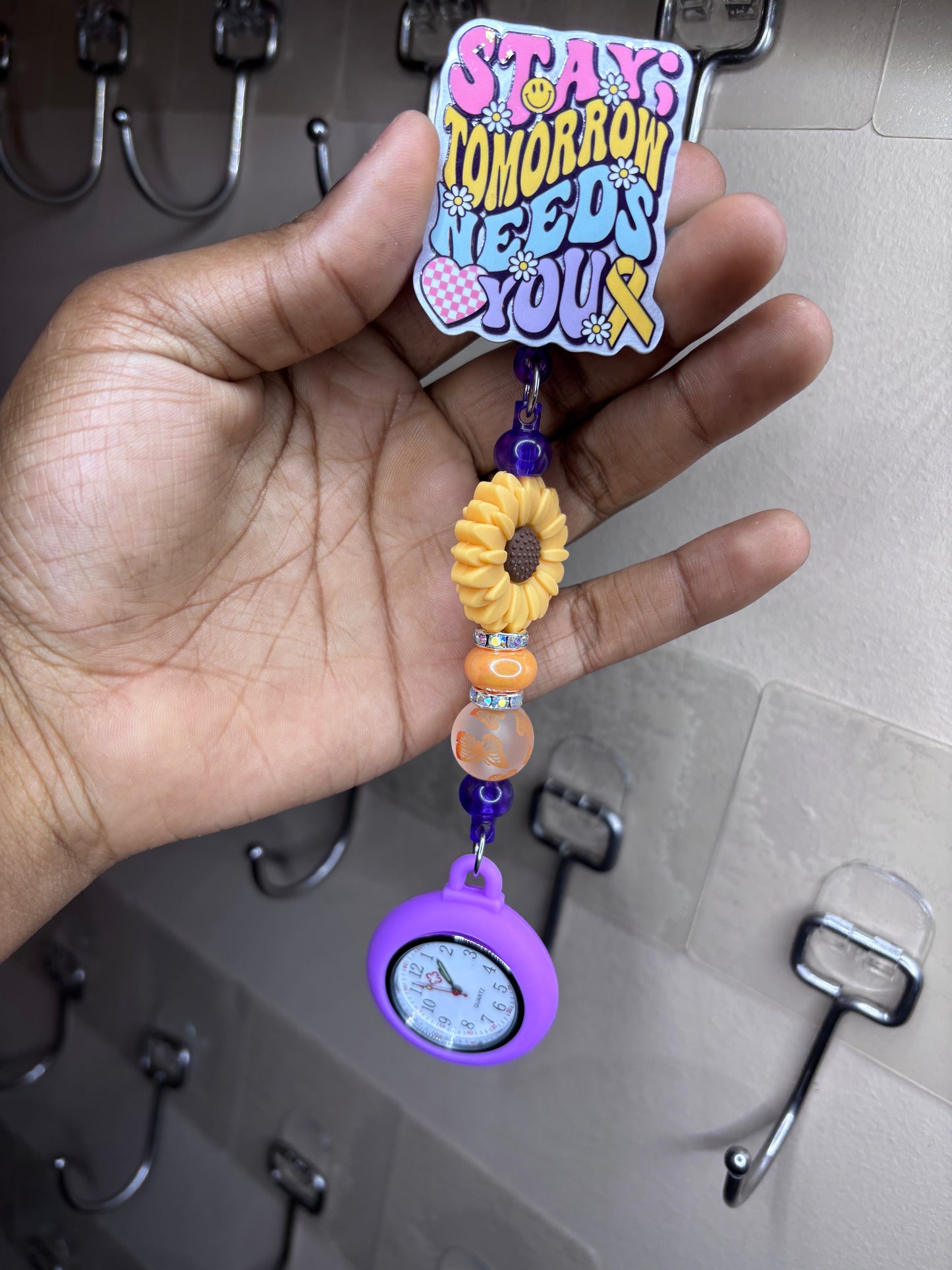 Need you clock badge